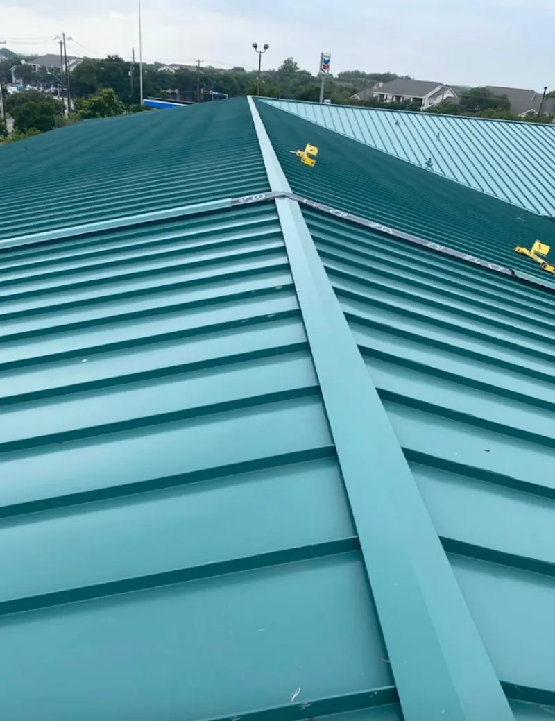 Green commercial metal roof ridge and valley for Metal Roof Repair in Wallington